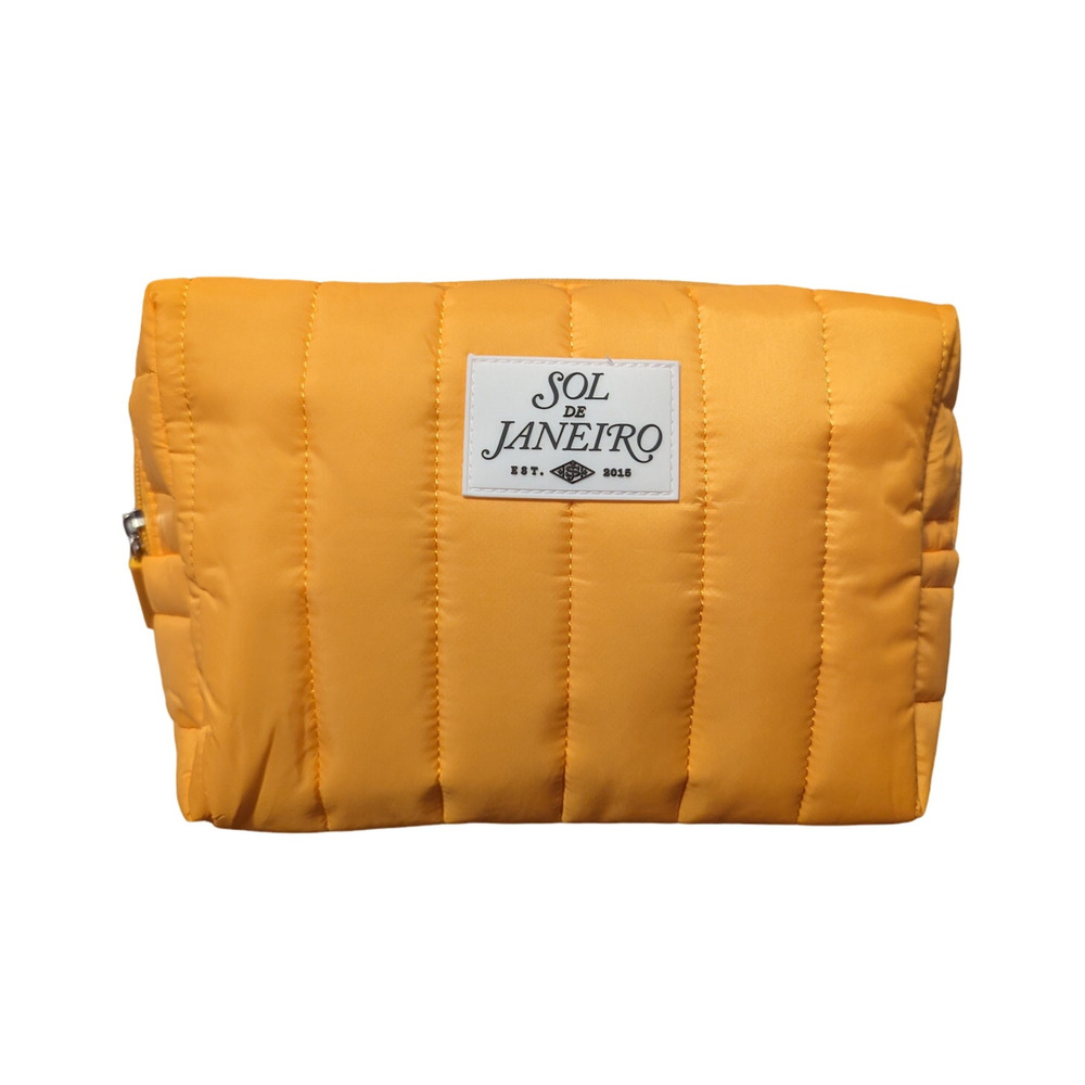 Sol De Janeiro TSA-approved quilted travel pouch